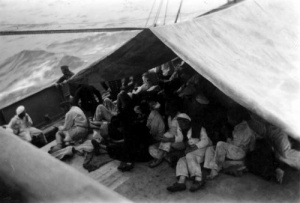 Survivors from the German raider Kormoran sheltering on Yandra's well deck. (Kim Hay collection)