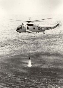 RAN Sea King Shark 04 engaged in dipping sonar operations.