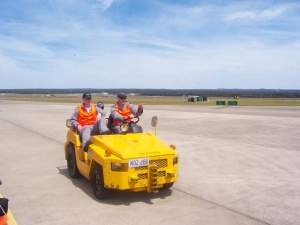 Ground crew on the tarmac at HMAS Albatross.