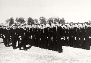 HMAS Nirimba's commissioning company being inspected by Rear Admiral Henry Showers, 1 April 1953.