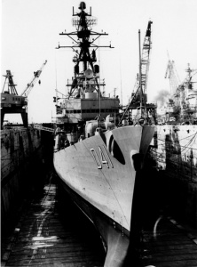 HMAS Brisbane (II) in dry dock in the Boston Naval Shipyard. Her commissioning day was declared 'Brisbane Day' throughout the 'Commonwealth' of Massachusetts.