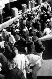 Kormoran survivors being landed in Carnarvon from HMAS Yandra.