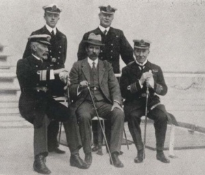 Australia’s First Naval Board. Back row: Staff Paymaster Eldon Manisty, RN, Engineer Commander W Clarkson, RAN. Front row: Rear Admiral WR Creswell, RAN, Defence Minister Senator George F Pearce, Captain Constantine Hughes-Onslow, RN.