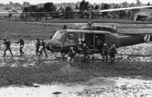 135th slick unloading troops in Landing Zone.