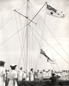 The RAN White Ensign is raised for the first time at HMAS Watson on 1 March 1967.