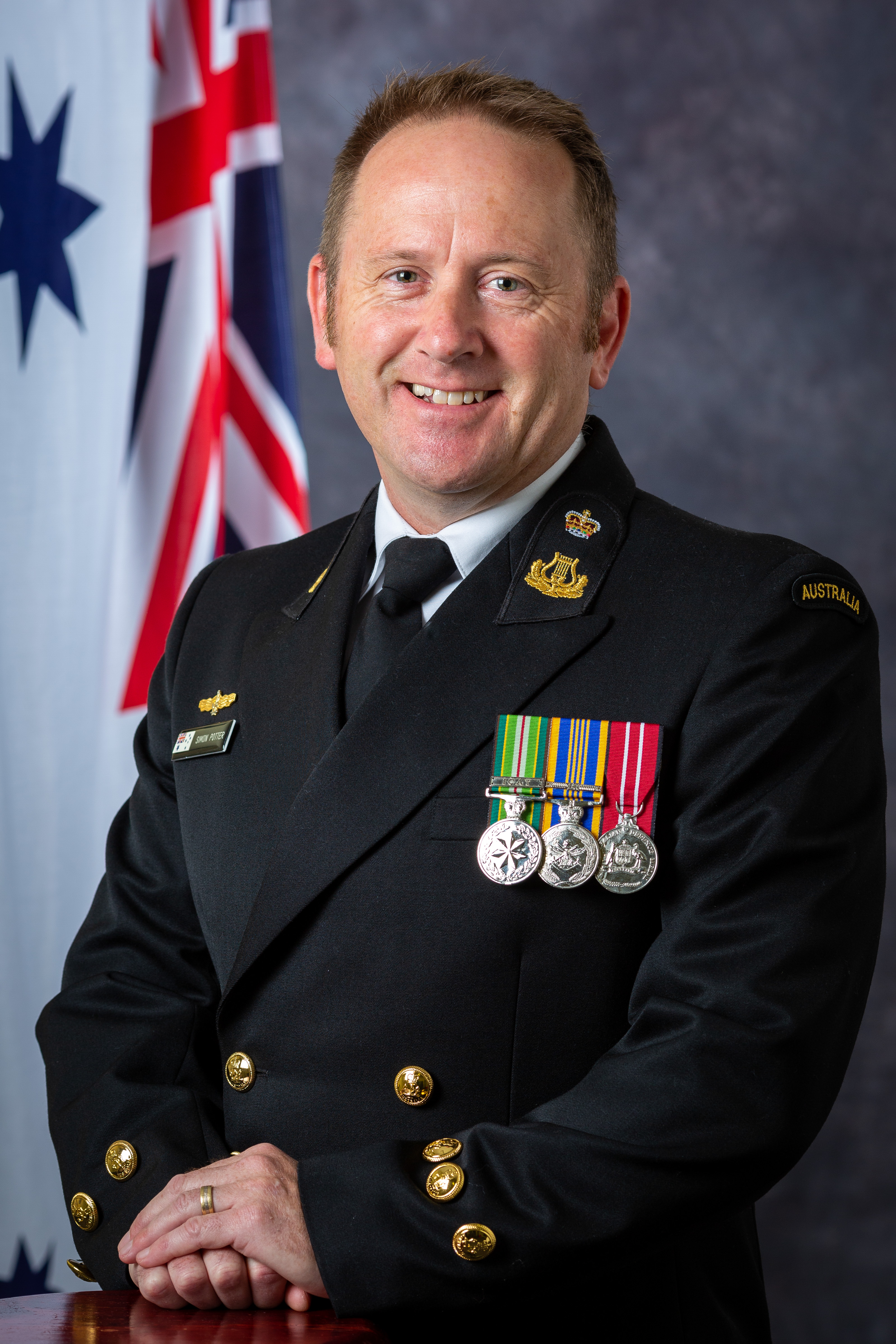 Bandmaster, RAN Band Queensland, Chief Petty Officer Mike Vaughan.