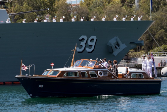 The ship's company in HMAS Hobart "cheer ship" as outgoing Commander Australian Fleet, Rear Admiral Stuart Mayer and his family make a final voyage in the Admiral's Barge from Fleet Base East.