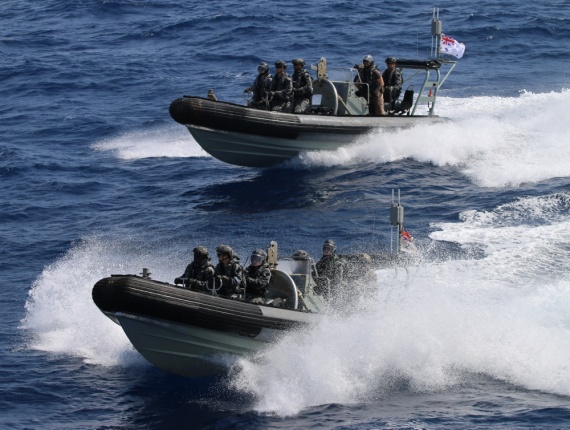 HMAS Ballarat's boarding party close on a suspicious dhow for a boarding.