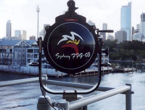 A ten-inch signalling lamp decorated with the Sydney Olympic logo aboard HMAS Sydney (Russ French).