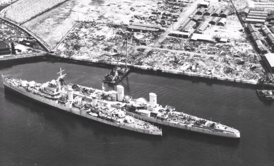 The end of the line for HMAS Hobart (I) and one of the Royal Navy's modified Dido Class cruisers at the breakers yard in Japan.