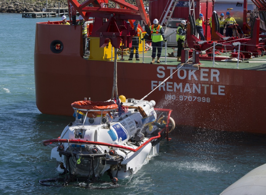 The submarine rescue vessel LR5 is launched off the work deck of MV Stoker into the basin at Fleet Base-West for a systems test run during Exercise BLACK CARILLON 2016.