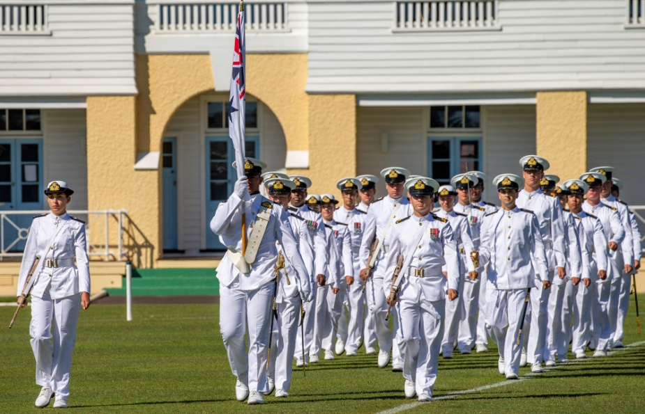 The guard marches onto the parade ground at HMAS Creswell in Jervis Bay during the New Entry Officers' Course 63 graduation ceremony, November 2020.