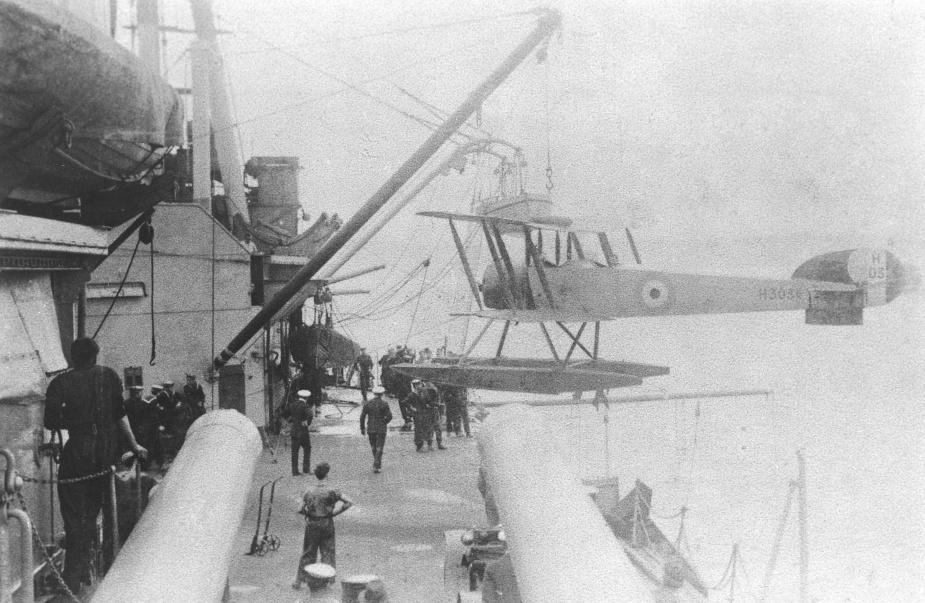 An AVRO 504L floatplane being hoisted aboard HMAS Australia in 1920.