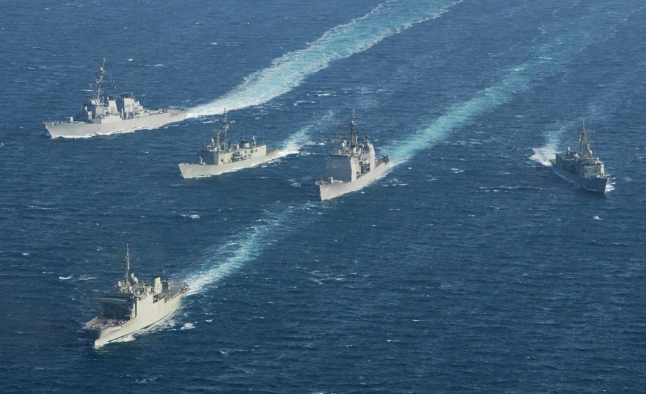 HMA ships Canberra, Manoora and Newcastle proceed as part of a multi-national task group during Operation SLIPPER. c. 2002