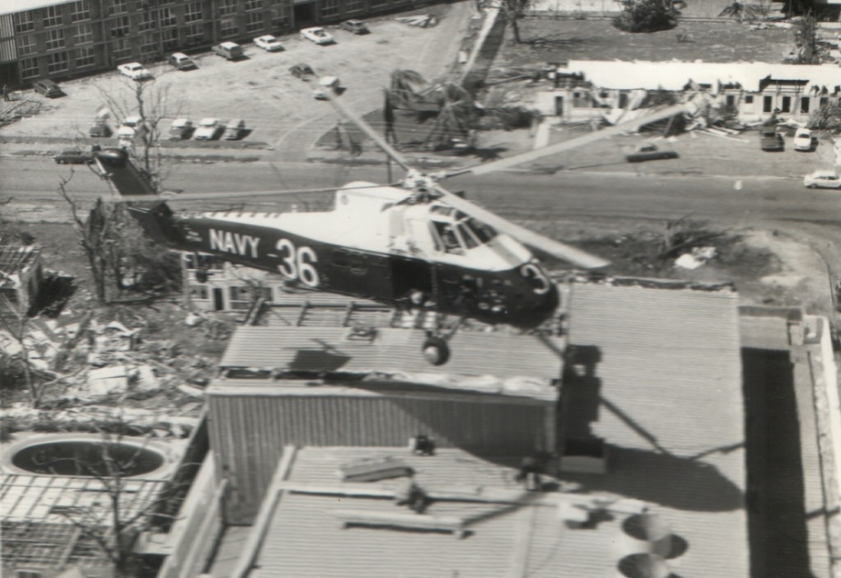 A Wessex hovers over the Travelodge Hotel in the aftermath of Cyclone Tracy.