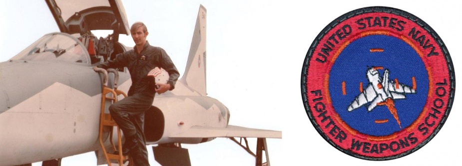 Barry Evans beside an Northrop F5 fighter while on course at the USN Fighter Weapons School