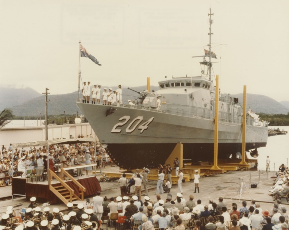 A large crowd gathered at the North Queensland Engineers and Agents shipyard to witness the launching of HMAS Warrnambool, 25 October 1980.