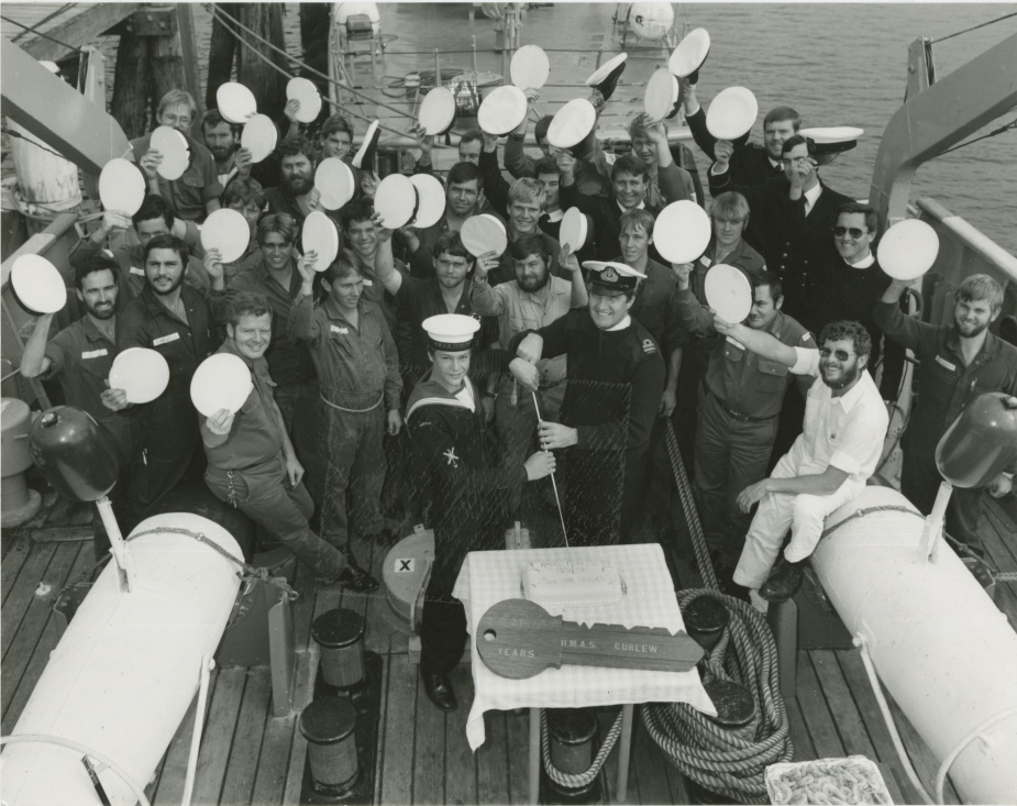 Ship's company celebrate the twenty-first birthday of HMAS Curlew