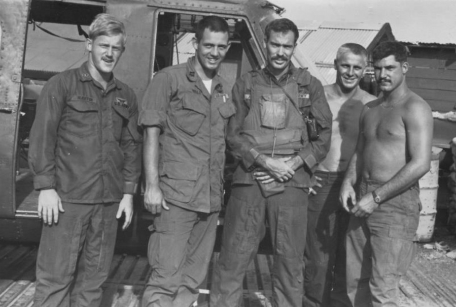 The crew of Noel's 'Taipan' Gunship pose with Warrant Officer 2 Bob enders (centre) who was to witness the aircrafts last desperate moments. L-R: WO1 Steve Martin US Army (Co-pilot), Captain Mike Phillip (Aircraft Captain), WO Enders, Leading Aircrewman Noel Shipp and Specialist 4 Byron Bowden, US Army.