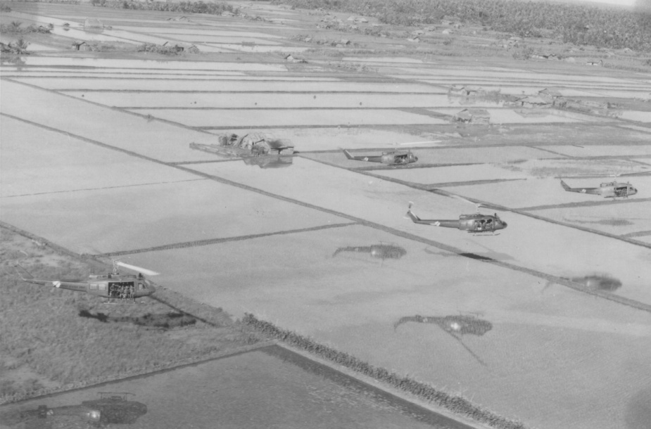 135th AHC slicks flying low over rice paddies in South Vietnam. (Max Speedy Collection)