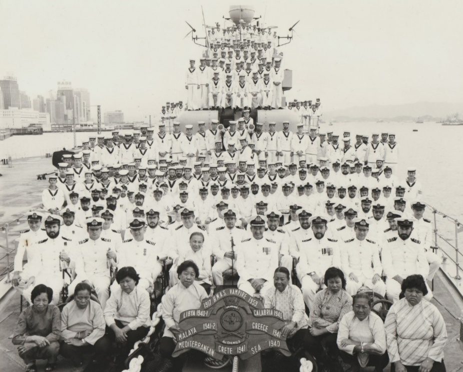 HMAS Vampire's ship's company with 'Jenny's Side Party' in Hong Kong, 1979.