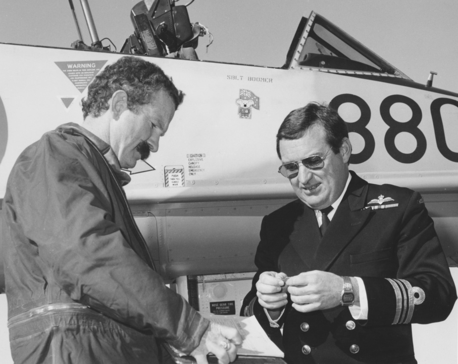 John hands over the keys to VC724 Skyhawks to Squadron Leader Bates, RNZAF, July 1984.