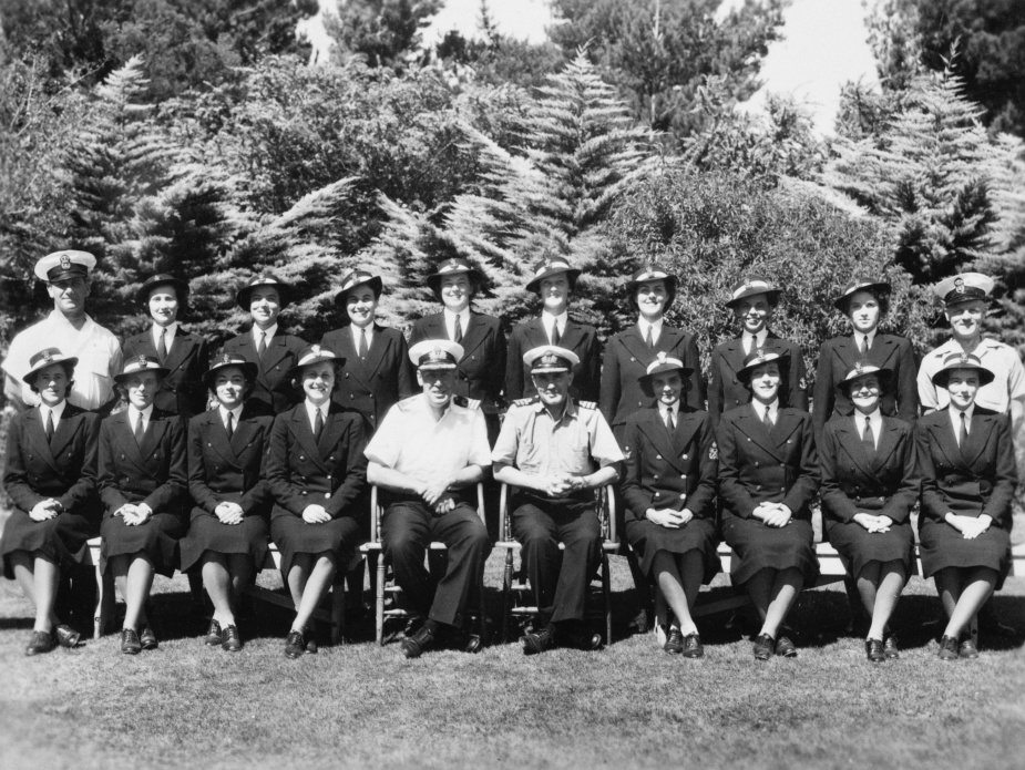 Members of the first WRANS Officer training class January 1943. Back row: Chief Petty Officer Wells (instructor), Marion Egan, Jean Thompson, Mary Butler, Margaret Curtis-Otter, Sheila McClemans, Blair Williams (Bowden), Joan Furley, Nancy Spier, Chief Petty Officer Harding. Front row: Lorna Bradford, Betty Bradford, Joyce Medcalfe, Joan Cowie, Commander Baldwin, Commander Phelp, Frances Provan, Edna Goulston, Alice Gould, Thelma Fenton.