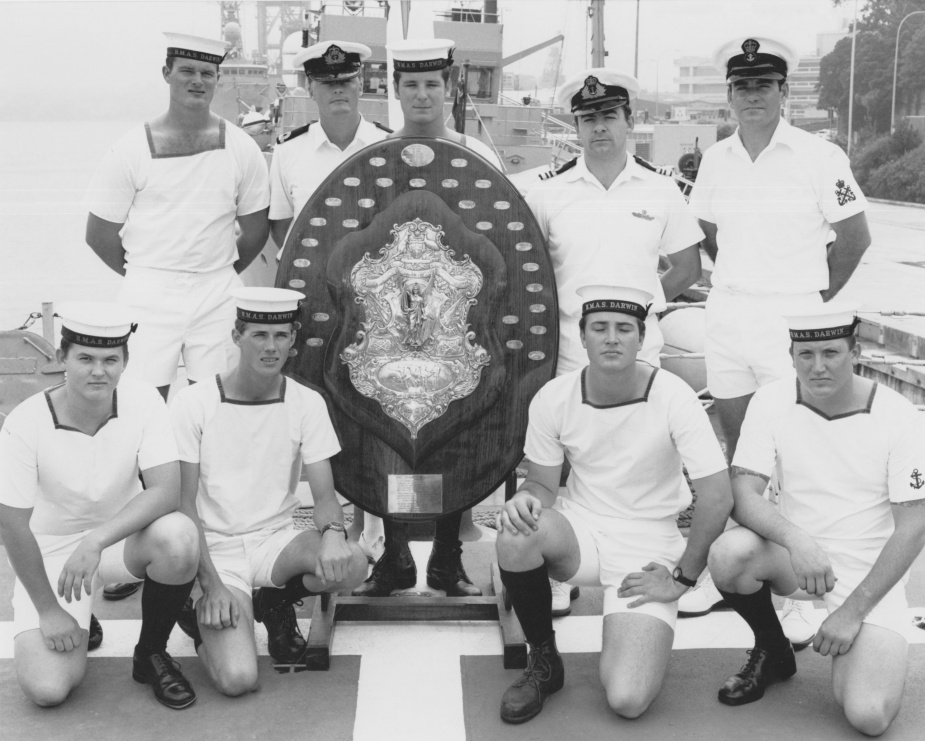 HMAS Darwin crew members pose with the Otranto Shield in 1987.