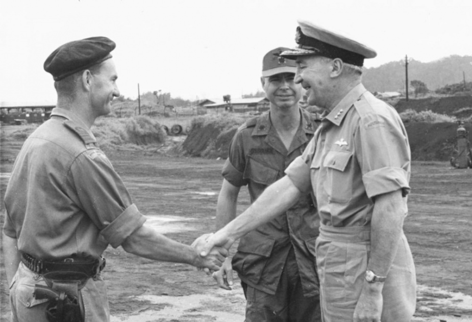 Lieutenant Commander Neil Ralph (CO RANHFV) greets Vice Admiral Victor Smith (Chief of Naval Staff) during his visit to Vietnam.