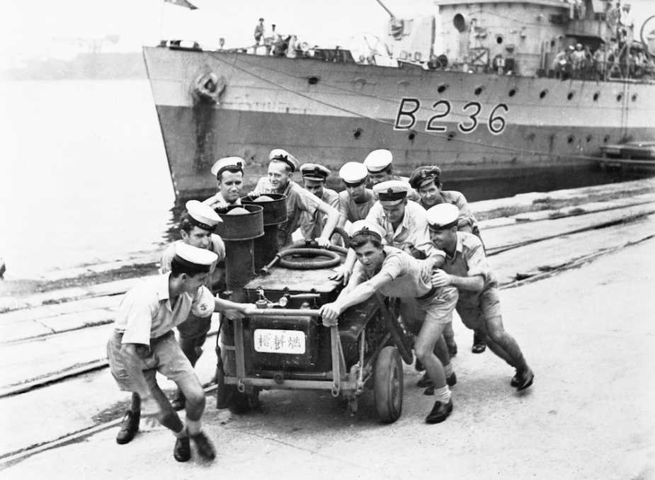 Sailors from Ballarat clear the wharf on the ship's arrival at Yokosuka Naval Base, Japan, September 1945.