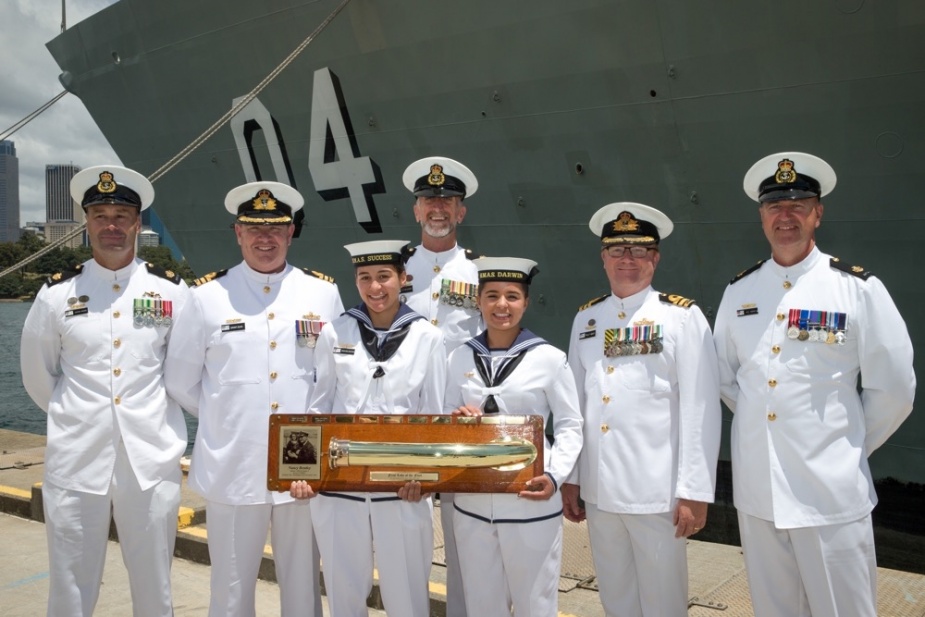 HMAS Darwin passes on ‘The First Lady’ to HMAS Success (II), as they become the longest serving ship in the fleet after the decommissioning ceremony for HMAS Darwin at Fleet Base East, Sydney, December 2017.