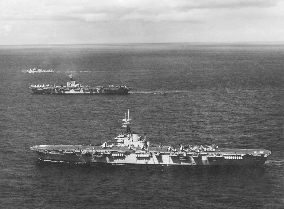 HMAS Vengeance in the foreground with Sydney and Quadrant in the background. 