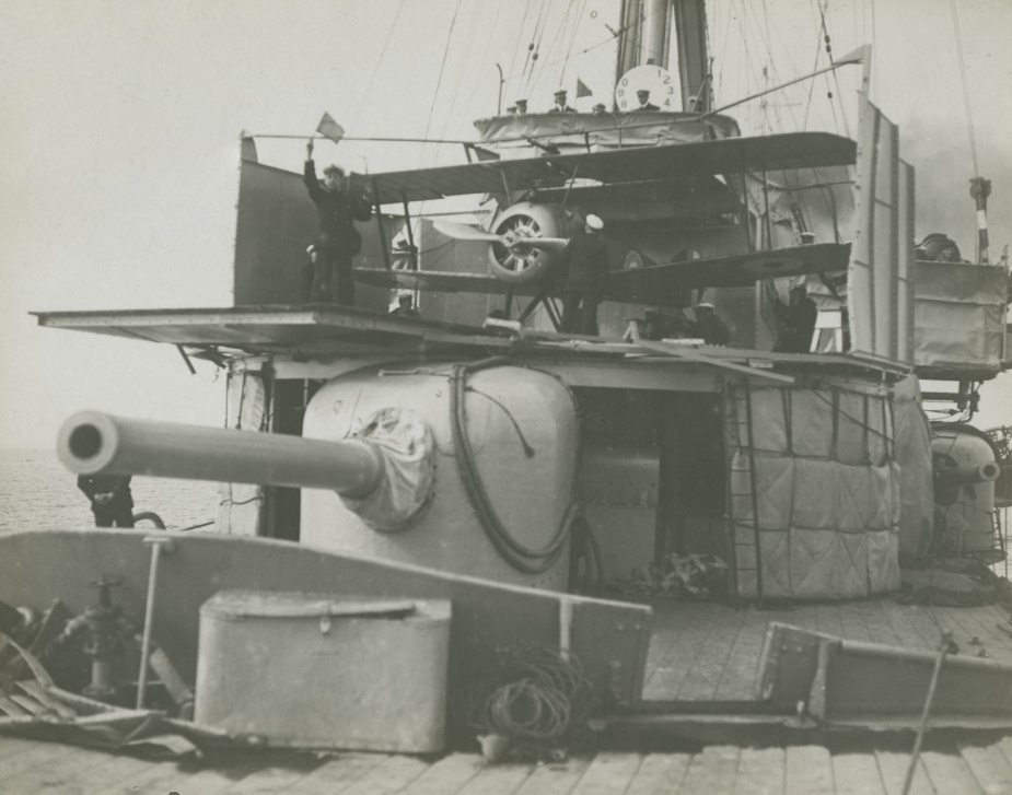 HMAS Sydney with her Sopwith Camel mounted on the flying-off platform in 1918.
