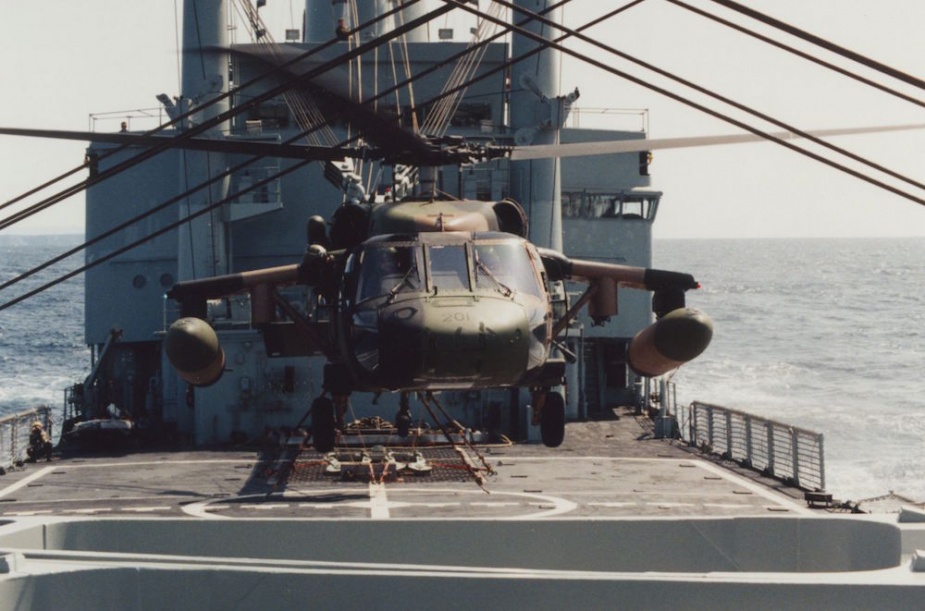 An S70-A-9 Blackhawk conducting first-of-class flight trials on Tobruk.