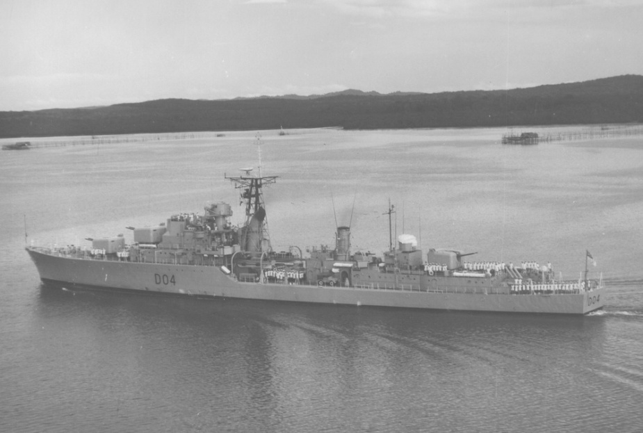 Voyager transiting the Johore Strait, January 1958.