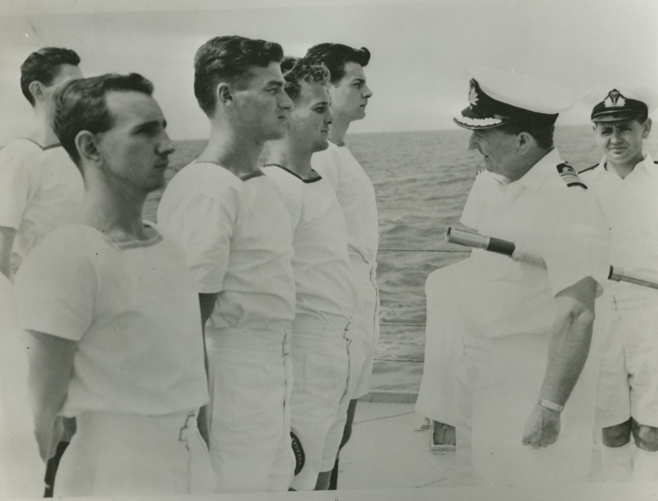 Captain Stevens inspecting members of Voyager's crew c.1963