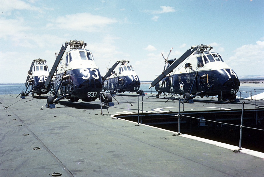 Sydney's embarked Wessex helicopters secured on deck.