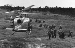 Slicks of the 135th about to extract infantry from landing zone.