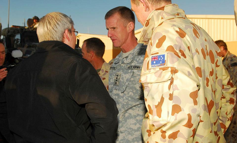 Prime Minister Kevin Rudd and Commander ISAF General Stanley McChrystal talk with soldiers during a visit to the Special Operations Task Group at Camp Russell, Oruzgan Province, Afghanistan in 2009. Photographer: CPL Rachael Ingram.