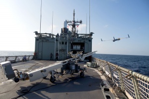 ScanEagle is launched from the flight deck of HMAS Newcastle in the Middle East region.