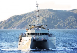 HMAS Benalla conducts a beach survey off the coast of Cairns during the Minor War Vessel Concentration Period