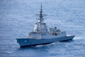 HMAS Brisbane sails in waters off the coast of NSW following an SM-2 standard missile-firing serial.